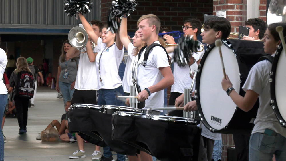 Jensen Beach Marching Band plays for FAWE Students