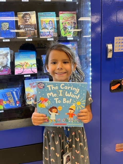 JBE student gets book out of book vending machine
