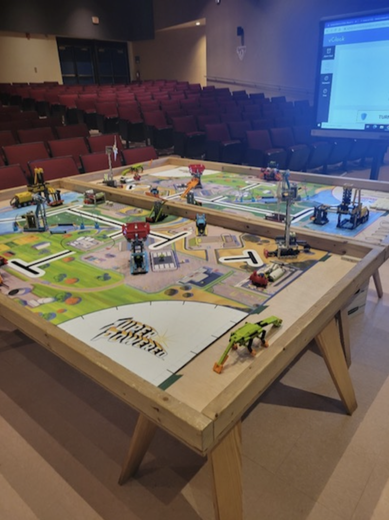School Board Member Tony Anderson visits Dr. David L. Anderson Middle students during Robotics event