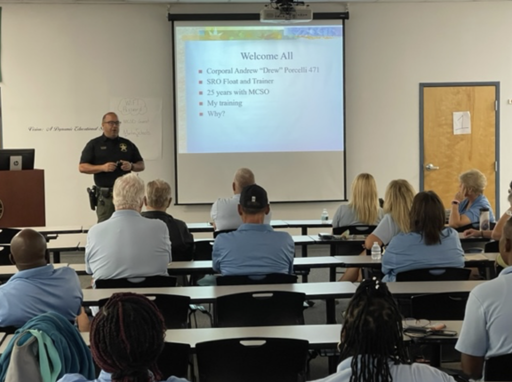 Corporal Drew Porcelli instructs training session for MCSD transportation employees
