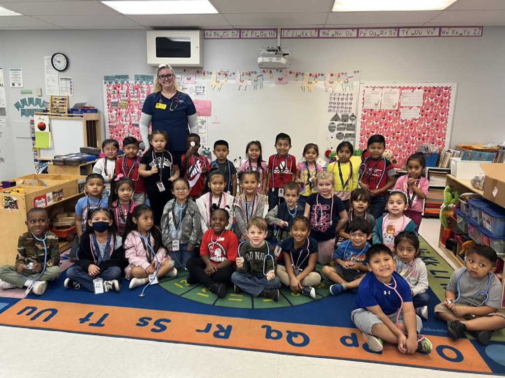 Warfield Elementary students treated to many community guest readers during Celebrate Literacy Week