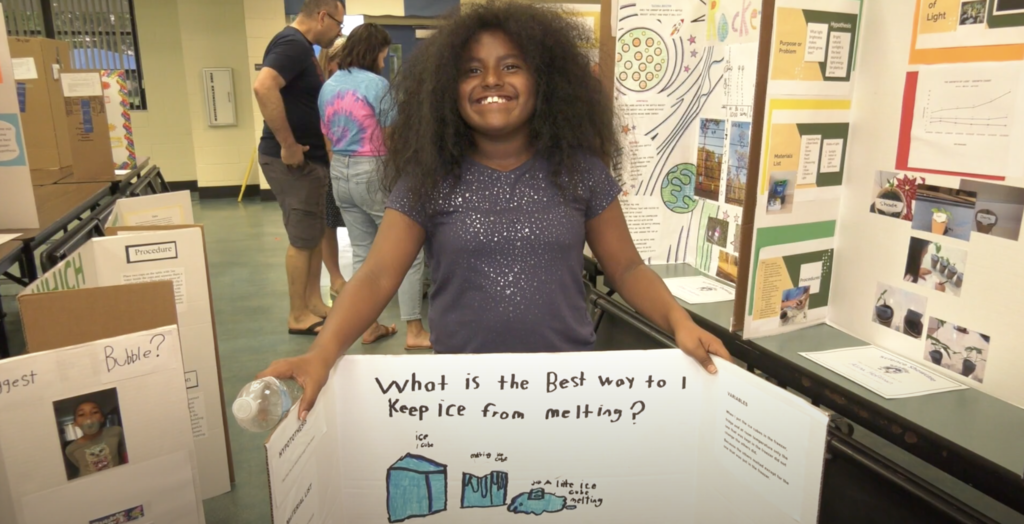 SeaWind Elementary student shows off science project